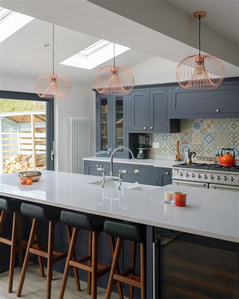 Dark grey / anthracite shaker kitchen design with tiled backsplash and ...