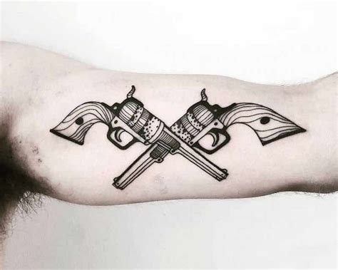 Pin on 25 of the Best Gun Tattoos