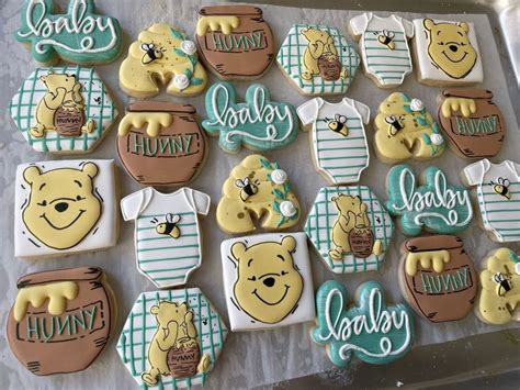 Baby Shower Cookies Decorated With Winnie The Pooh And Honeycombs Are