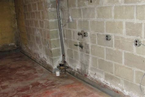 Interior basement perimeter drain systems - Low cost waterproofing