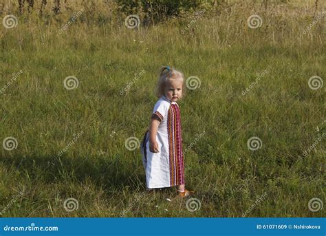 Blonde Girl In Ukrainian Style Dress On A Grass I Stock Image Image Of Female Ukraine 61071609