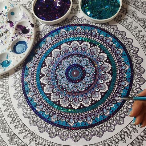 A Person Is Painting On A Table With Two Bowls