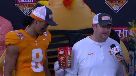 Ched Z Slides Box Of Cheez It Crackers Through Josh Heupel S Postgame