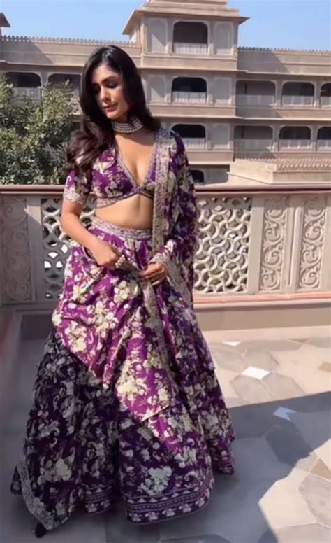 Mrunal Thakur Looks Like Royal Princess In Purple Silk Lehenga With