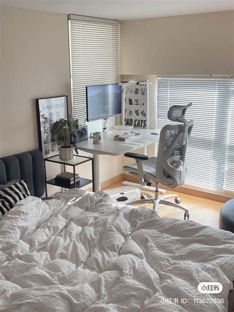 A Bed Sitting In A Bedroom Next To A Computer Desk