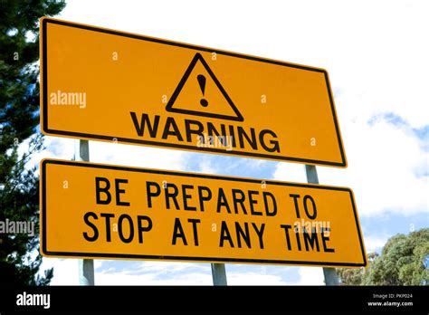 Warning: Be Prepared to Stop at Anytime signage Stock Photo - Alamy
