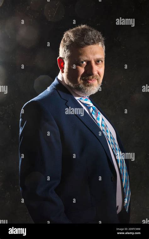 Mature Businessman In A Suit Studio Portrait Stock Photo Alamy
