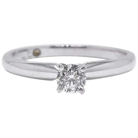 Leo Round Diamond 1.01 Carat Solitaire Ring Platinum and 18 Karat White ...