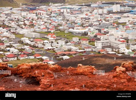 Heimaey town, Westman Islands, Iceland, with the volcano that nearly ...