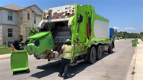 Metro Waste Systems Autocar WX64 EZ Pack Goliath Rear Loader Garbage