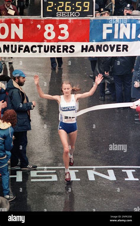 Grete Waitz, of Norway, crosses the finish line Sunday, Oct. 23, 1983 ...