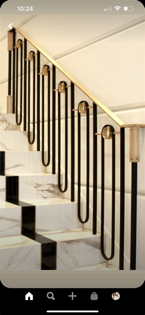 Modern Marble Staircase With Black And Gold Railings