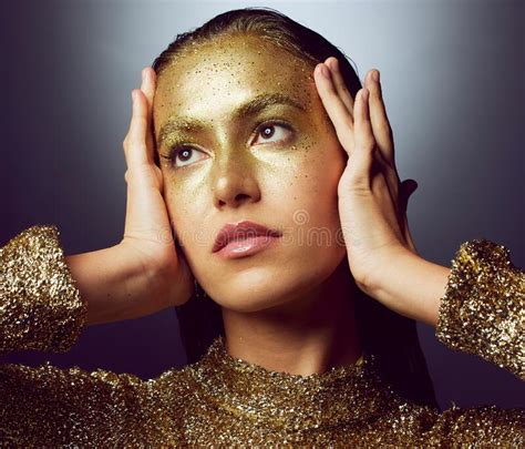 Glitter Gold And Makeup With Woman In Studio For Fashion Beauty And