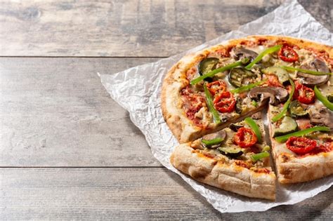 Premium Photo Vegetarian Pizza With Zucchini Tomato Peppers And