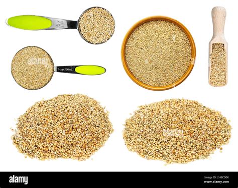 Top View Of Unhulled Foxtail Millet Seeds In Wood Spoon