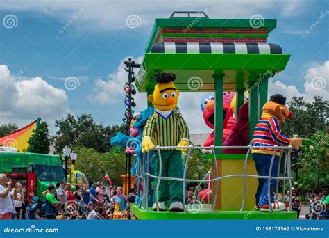 Bert Ernie And Police Woman Dancing In Sesame Street Party Parade At