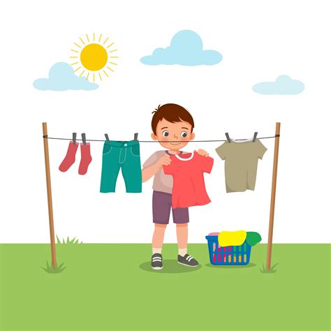 Cute little boy doing laundry chore hanging wet clothes outside under ...