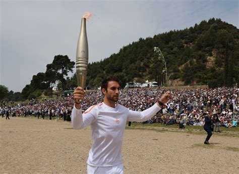 Paris 2024 Olympic Torch Lit In Ancient Olympia Greece As Relay Under Way