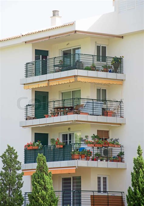 Portrait Of Tropical Apartment Building With Balconies Stock Image