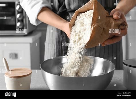 Pouring Flour Into Bowl Hi Res Stock Photography And Images Alamy