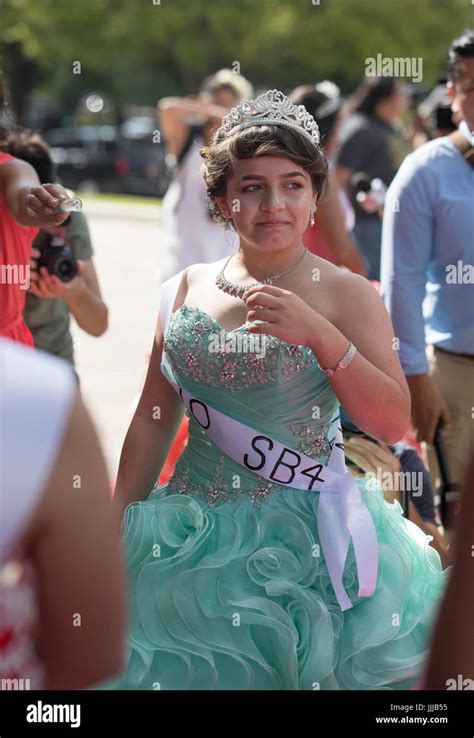 Teen Girls Wearing Mexican Style Quinceanera Dresses At The Texas