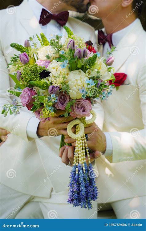 Lgbt Gay Bride And Groom With Flower Bouquet In Wedding Ceremony Stock Photo Image Of Love