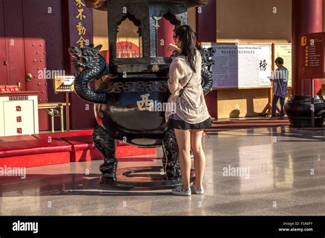 Worshiper Praying At The Hsi Lai Buddhist Temple Hacienda Heights