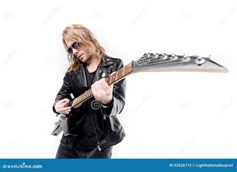 Handsome Rocker In Sunglasses Posing Playing Electric Guitar Isolated