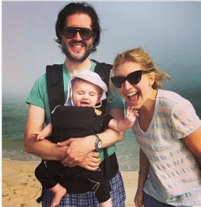 Sara Eisen enjoys the outing with husband Matthew Levine and son Samuel ...