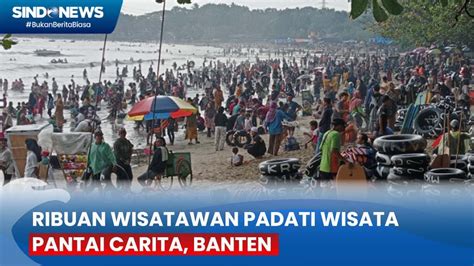 Libur Nataru Ribuan Wisatawan Padati Wisata Pantai Carita Banten