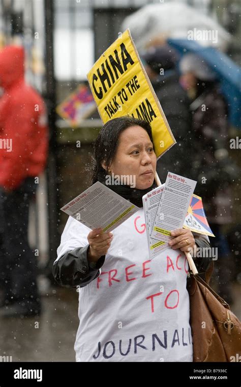 Protestor At London Olympic Torch Relay Stock Photo Alamy