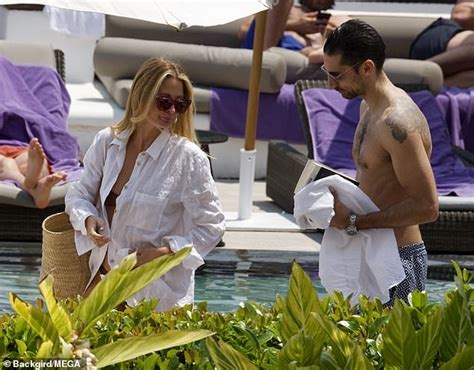 Millie Mackintosh Shows Off Her Figure In A Tiny Brown Bikini Daily Mail Online