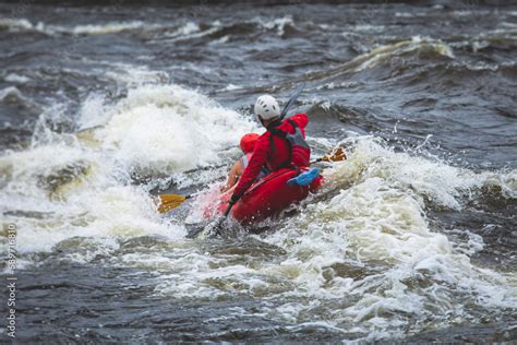 Raft boat during whitewater rafting extreme water sports on water ...