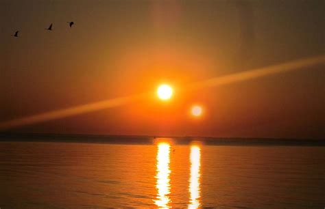 Sunset Of Two Suns Orange Suns Dusk Nature Sunset Reflection Sea