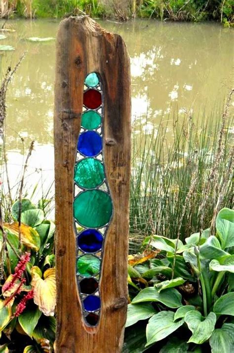 Use Sea Glass And Drift Wood Glass Garden Art Garden Art Sculptures Diy Garden Art Sculptures