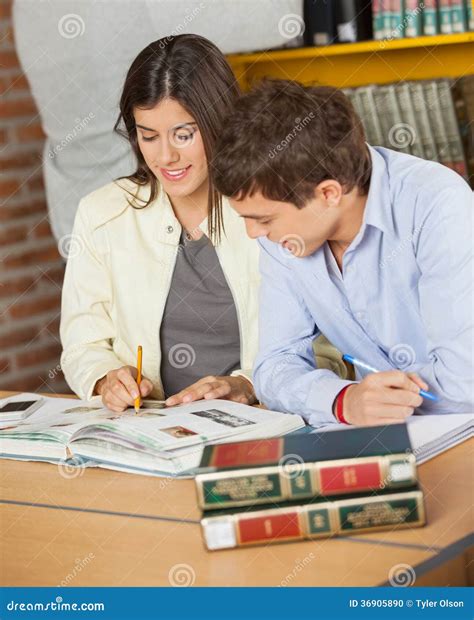 College Friends Studying Together At Library Stock Photo Image Of