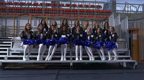 cheerleaders in black and white uniforms... | Stock Video | Pond5