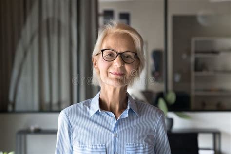 Positive Blonde Elder Businesswoman In Stylish Glasses Standing In Office Stock Image Image Of