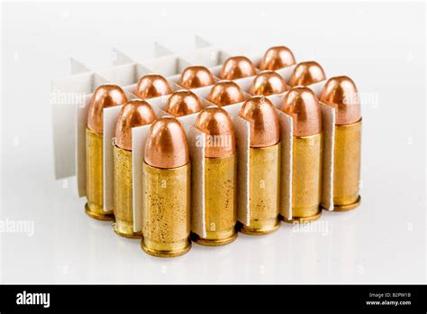 many different size bullets isolated on white Stock Photo - Alamy