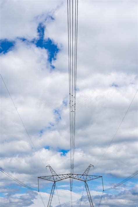 High Voltage Power Line Pylon On Blue Cloudy Sky Stock Photo Image Of