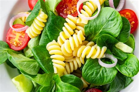 Premium Photo Pasta Green Salad Fusilli Tomato Cucumber Green Leaf