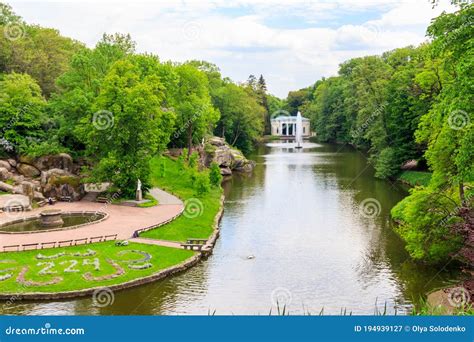 View Of Lake With Snake Fountain And Flora Pavilion In Sofiyivka Park