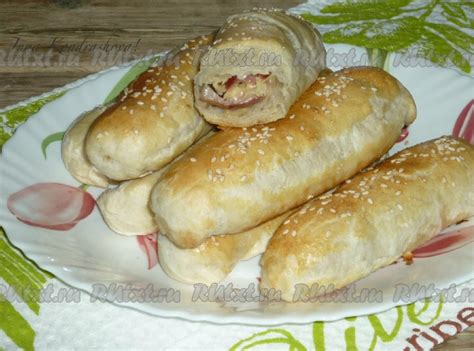 Слойки с ветчиной и сыром из слоёного бездрожжевого теста: 8 фото в рецепте