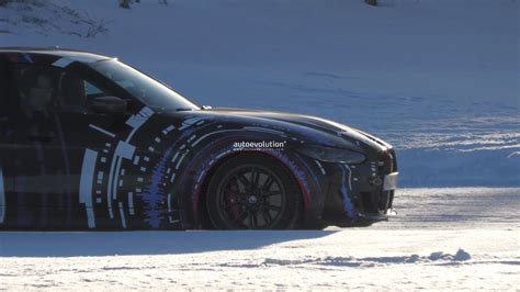 Quad Motor Bmw I M Performance Ev Spied Winter Testing Shows Wider