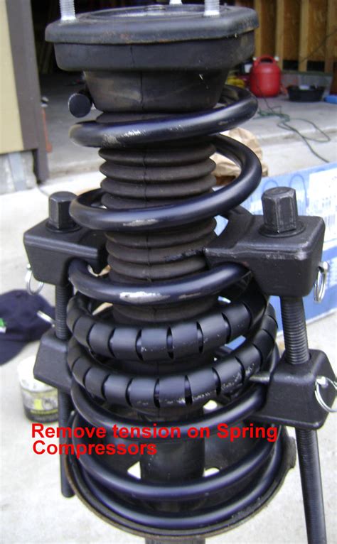 Replacing The Rear Strut And Or Coil Spring On A Toyota Camry With