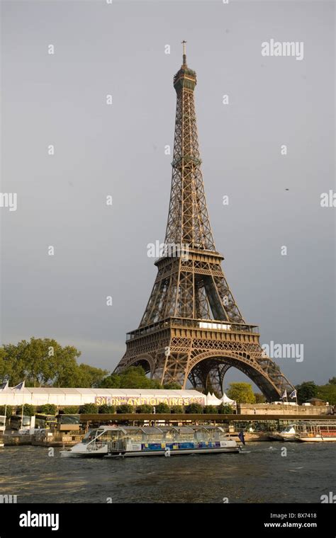 the eiffel tower and the seine with bateau mouche Stock Photo - Alamy