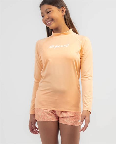 Shop Rip Curl Girls Script Long Sleeve Rash Vest In Peach Fast Shipping And Easy Returns City