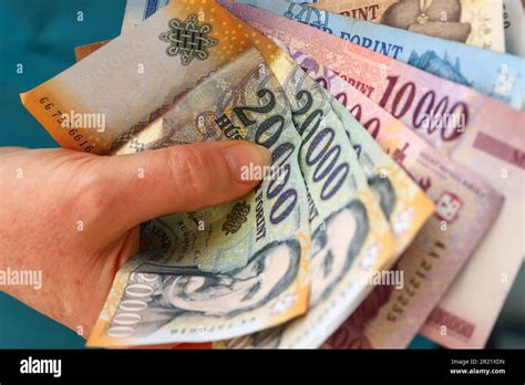 Hungarian Forint Money Woman Clutching A Handful Of Banknotes Large