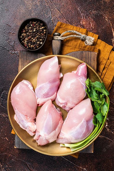 Premium Photo Free Range Raw Boneless And Skinless Chicken Leg Thigh