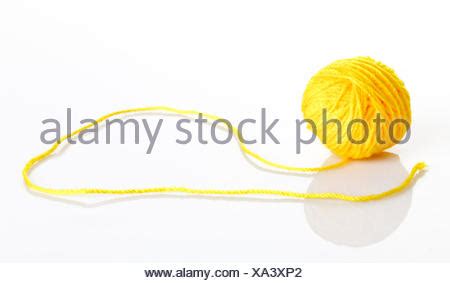 Yellow Wool Yarn Ball Isolated On White Background Stock Photo